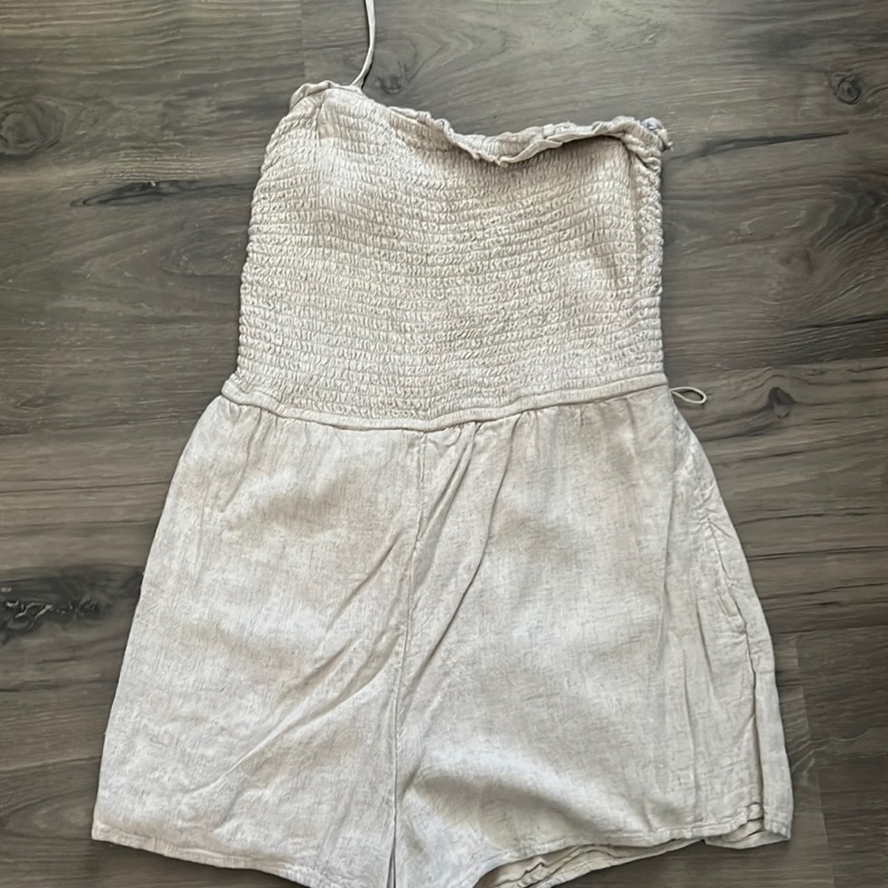 Tan smock jumper.